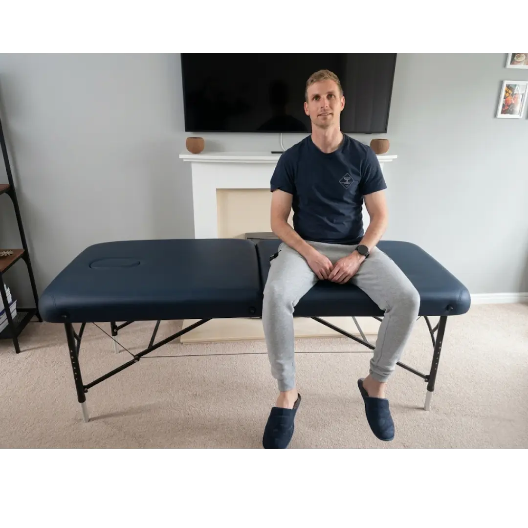 BodyPro Active professional massage table with lightweight adjustable aluminum legs; solves the issue of table instability and "rocking" during high-pressure deep tissue work for mobile and home-based therapists.