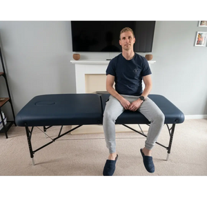 BodyPro Active professional massage table with lightweight adjustable aluminum legs; solves the issue of table instability and "rocking" during high-pressure deep tissue work for mobile and home-based therapists.