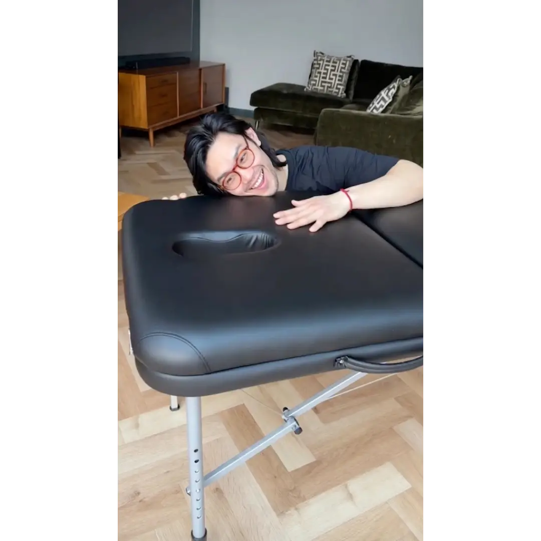 Earthworks Perform massage couch showcasing its built-in ergonomic breathe hole with premium soft-touch vinyl; perfect for a mobile therapist kit in London to solve the problem of facial pressure and client sinus discomfort without needing bulky external attachments.