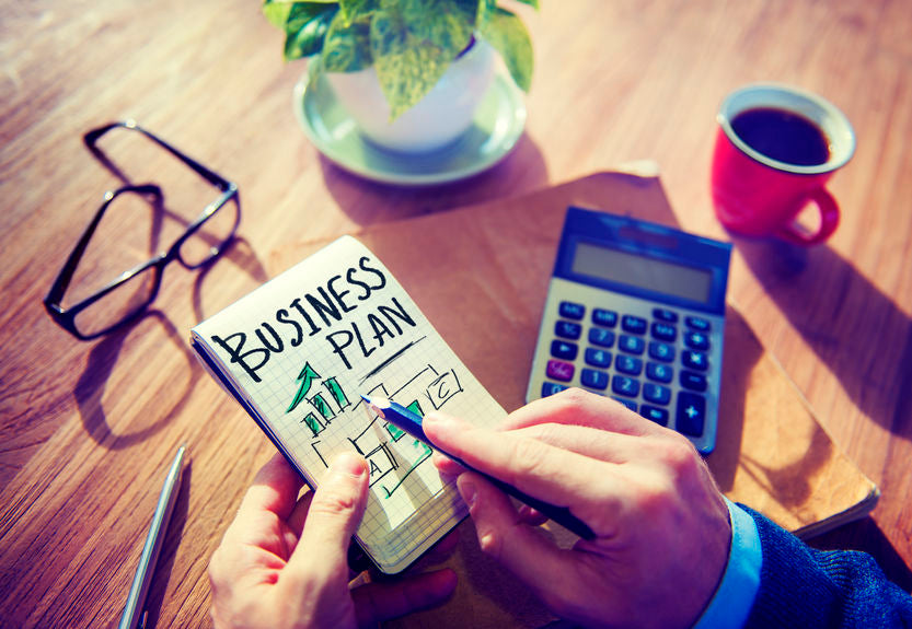 Male Massage Therapist Writing Business Plan Growth Concept