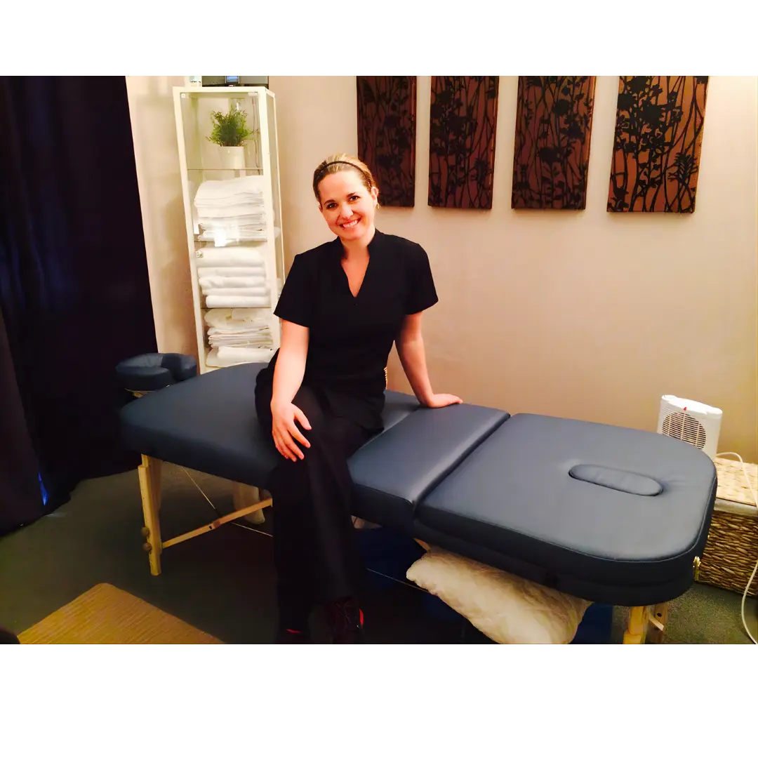 Earthworks Comfort Liftback massage table built with a sturdy wooden frame and multi-angle backrest; anchors a daily therapy practice in London to solve client lower back compression and muscle guarding through stable, secure elevation.