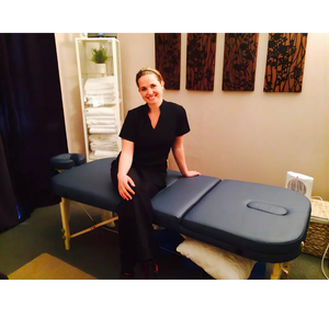 Earthworks Comfort Liftback massage table built with a sturdy wooden frame and multi-angle backrest; anchors a daily therapy practice in London to solve client lower back compression and muscle guarding through stable, secure elevation.