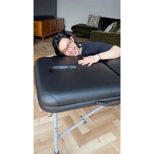 Earthworks Perform massage couch showcasing its built-in ergonomic breathe hole with premium soft-touch vinyl; perfect for a mobile therapist kit in London to solve the problem of facial pressure and client sinus discomfort without needing bulky external attachments.