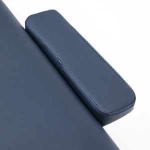 Close-up of the Porta-Lite Classic portable massage table showing the stain-resistant PU vinyl upholstery, precision-stitched rounded corners, and dual-end headrest accessory ports; a detailed view of the durable table top texture that solves the problem of premature fabric cracking and stripping from everyday massage oils and harsh sanitisation routines for mobile and home-based therapists in Liverpool.