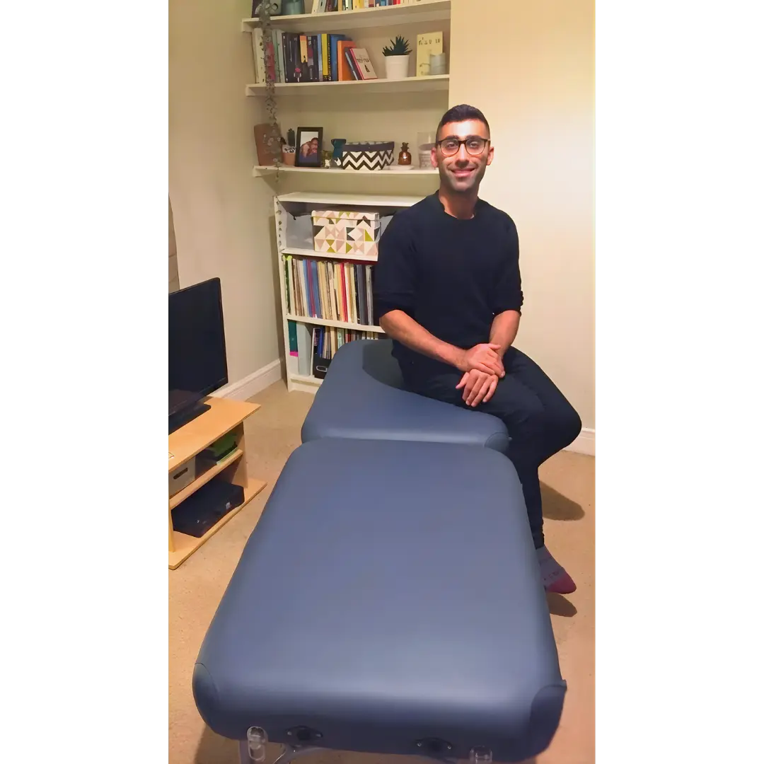 Navy PortaLite Delta I 10.3kg massage table with aluminum frame and high-density foam for mobile therapy.