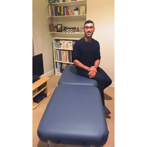 Navy PortaLite Delta I 10.3kg massage table with aluminum frame and high-density foam for mobile therapy.