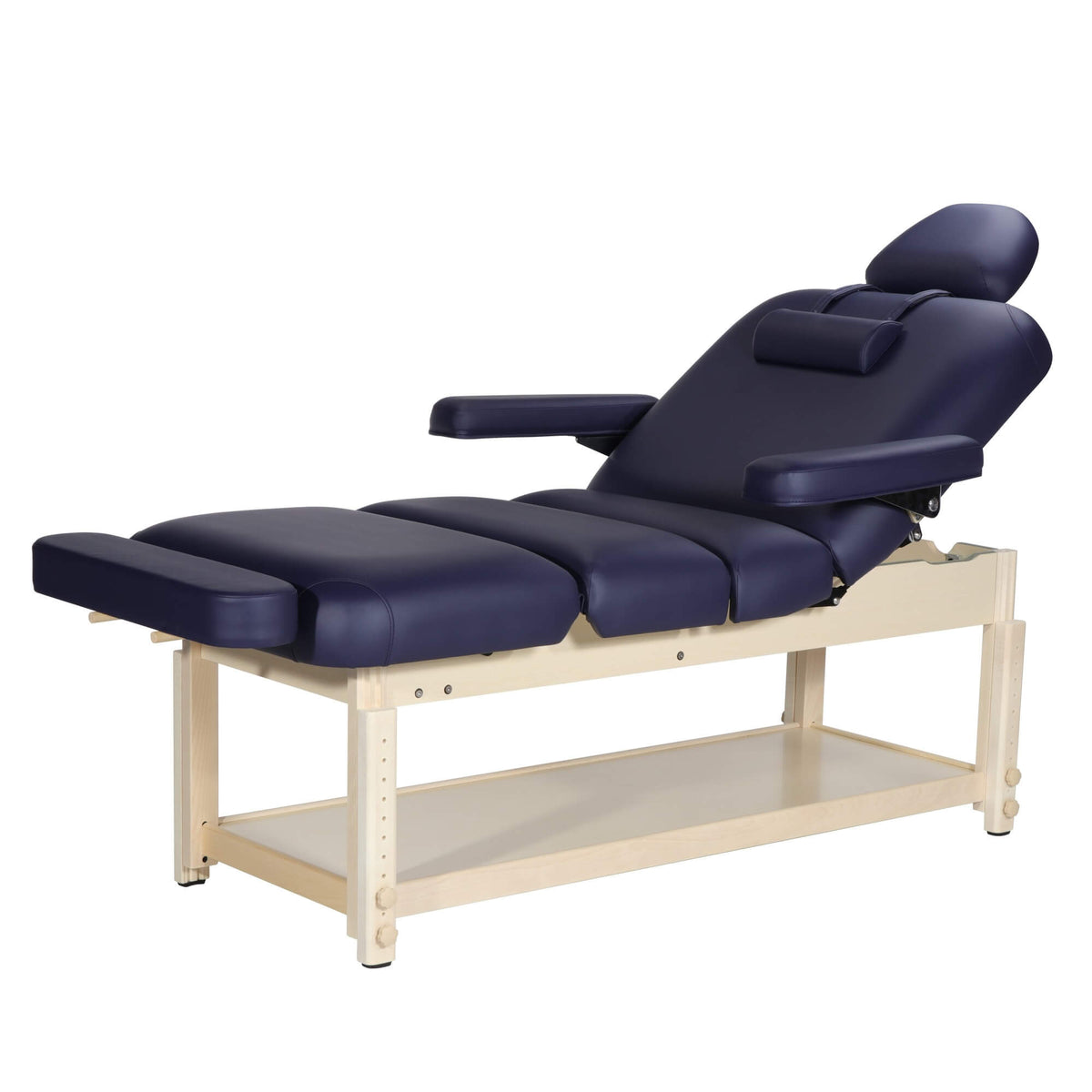 high-resolution studio display of a multi-section salon couch showcasing a matching navy blue massage table length extension seamlessly plugged into the footrest accessory ports; demonstrates how day spa owners and clinical physiotherapists in London can instantly extend their table surface area to comfortably accommodate tall clients without purchasing an entirely new bed.